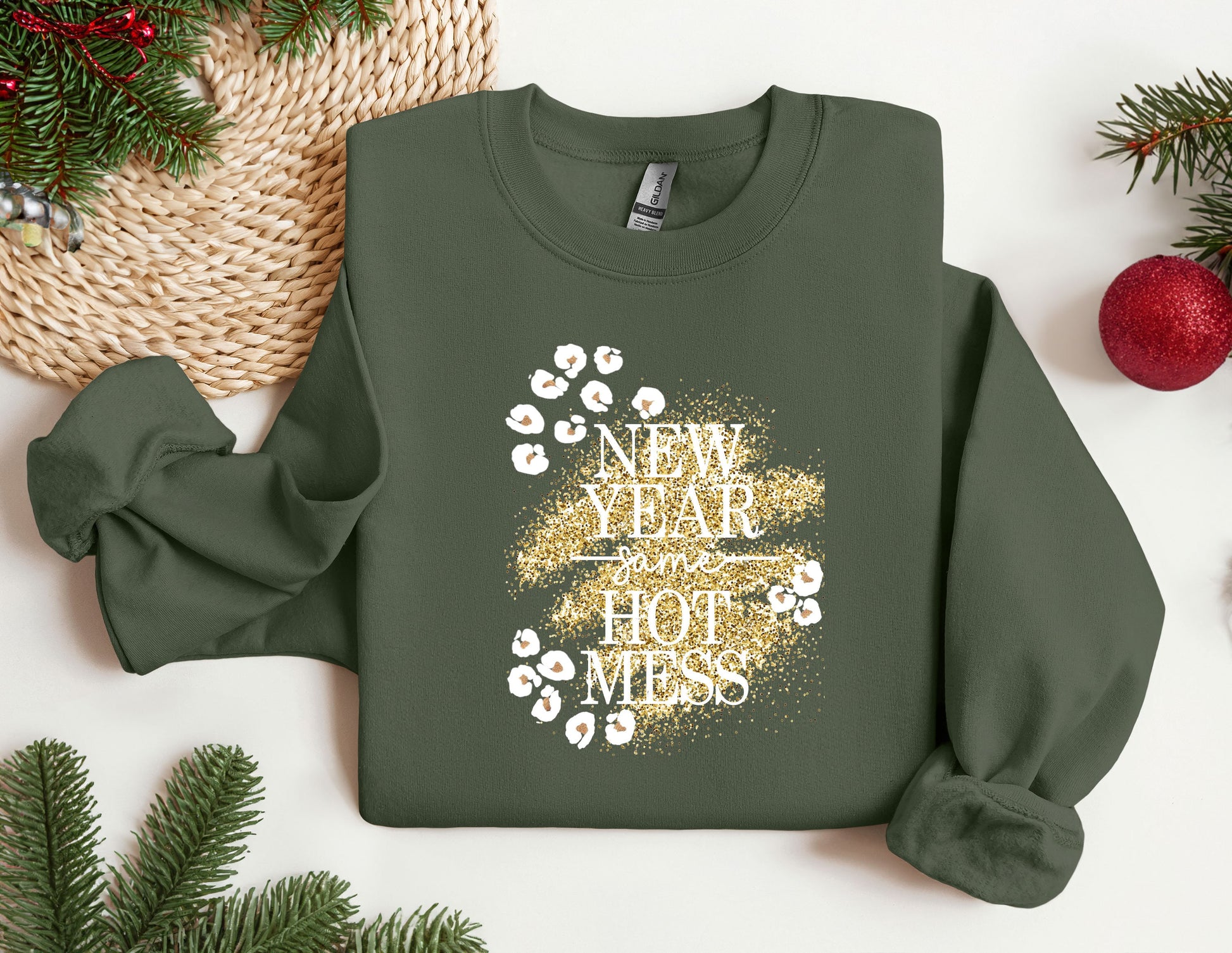 a green sweatshirt with a new year&#39;s resolution message on it