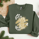 a green sweatshirt with a new year's resolution message on it