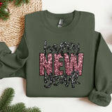 a green sweatshirt with the words i love new york printed on it