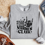 a grey sweatshirt with a black print on it