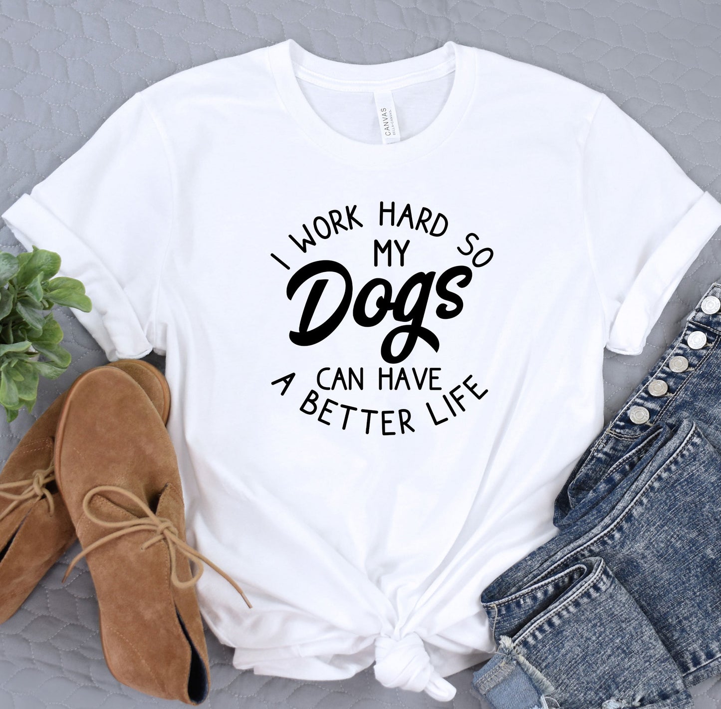 a t - shirt that says i work hard so dogs can have a better life