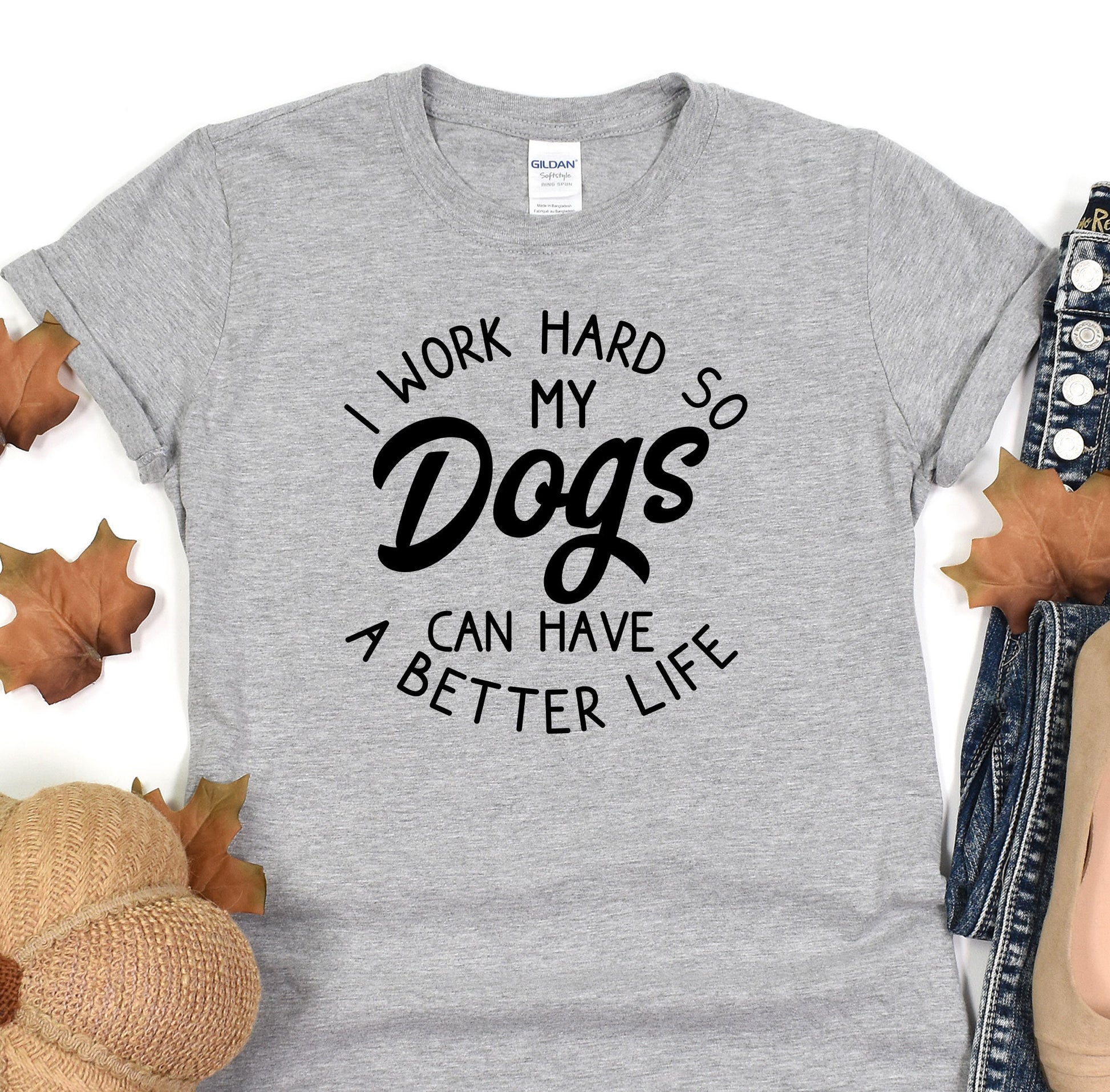 a t - shirt that says i work hard so my dogs can have a better