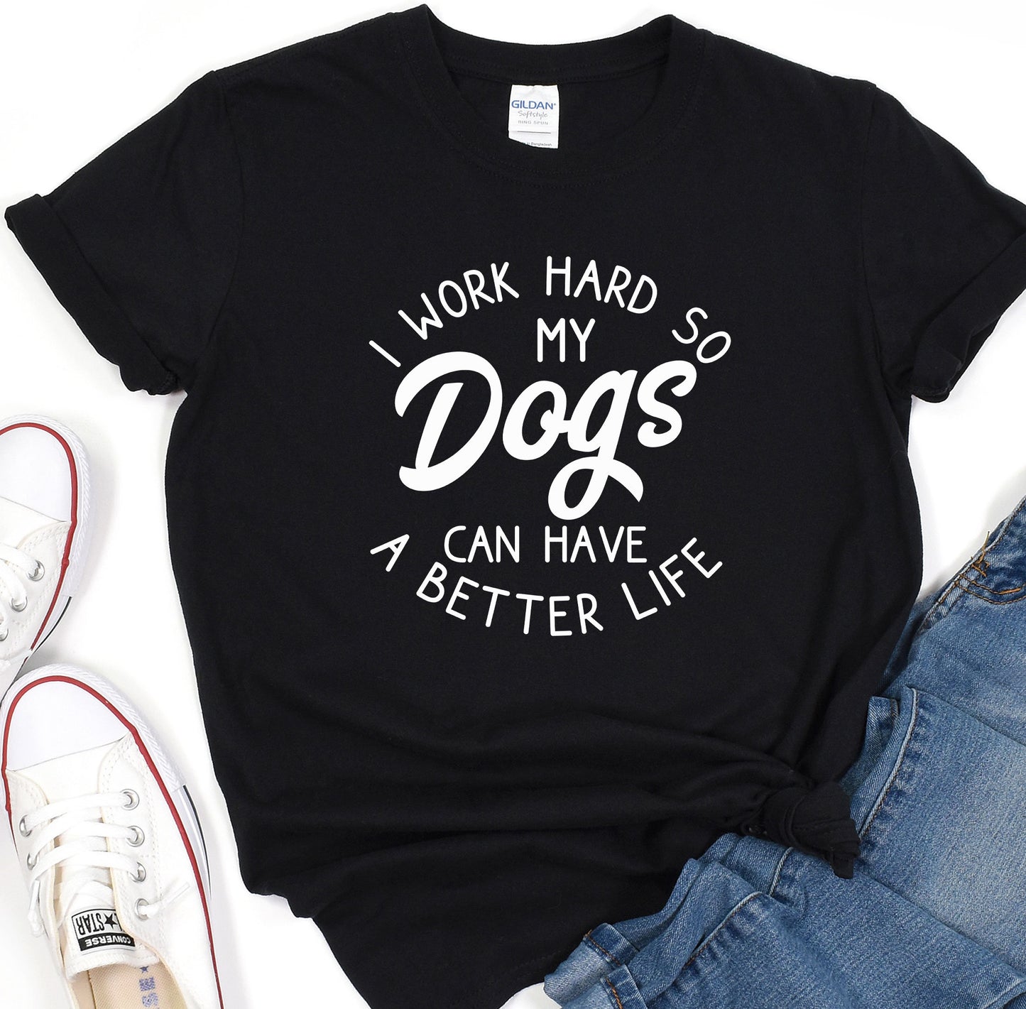 a t - shirt that says i work hard so my dogs can have a better