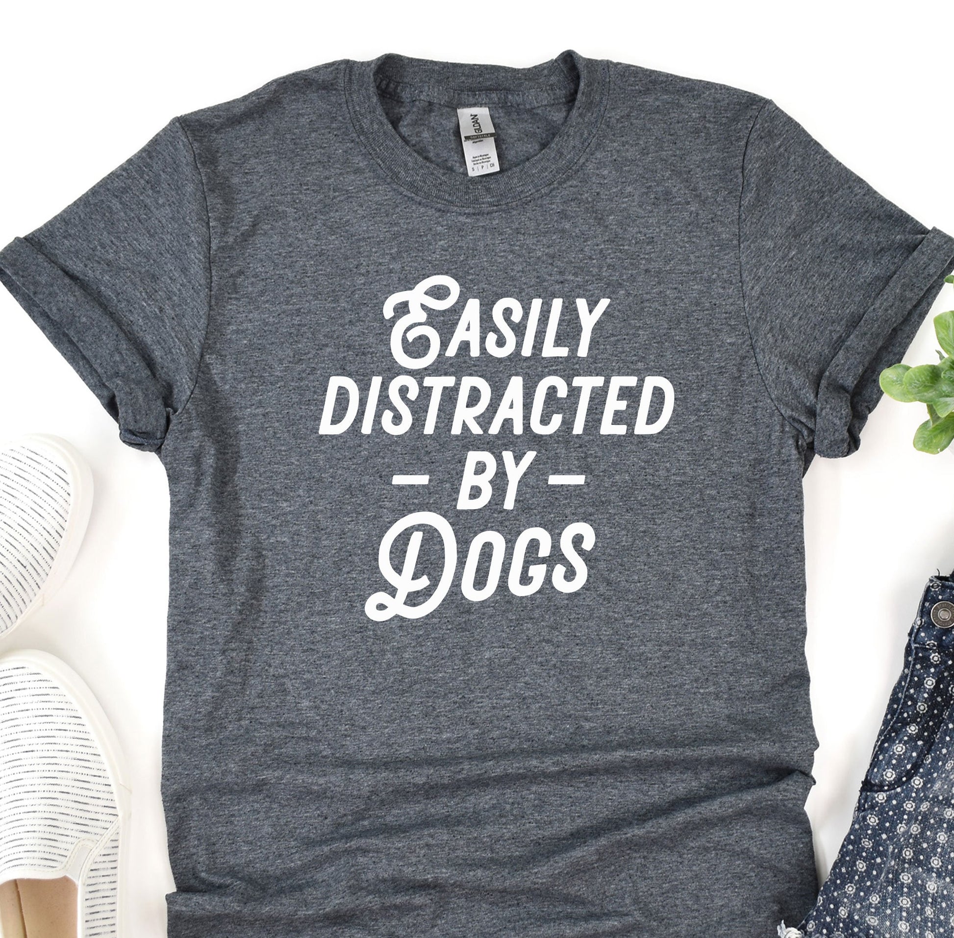 a t - shirt that says easily distracted by dogs