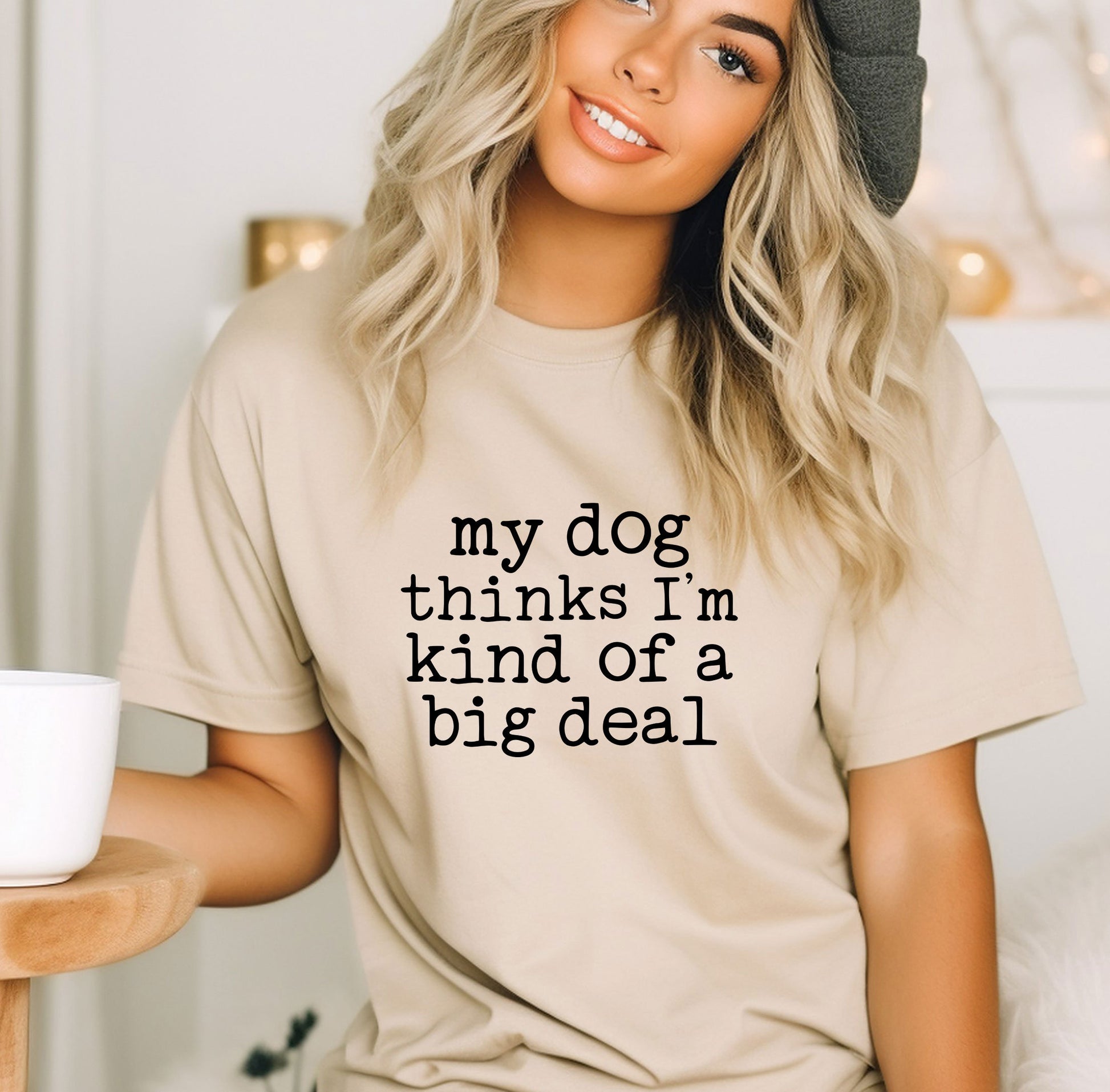 a woman wearing a t - shirt that says, my dog thinks i&#39;m