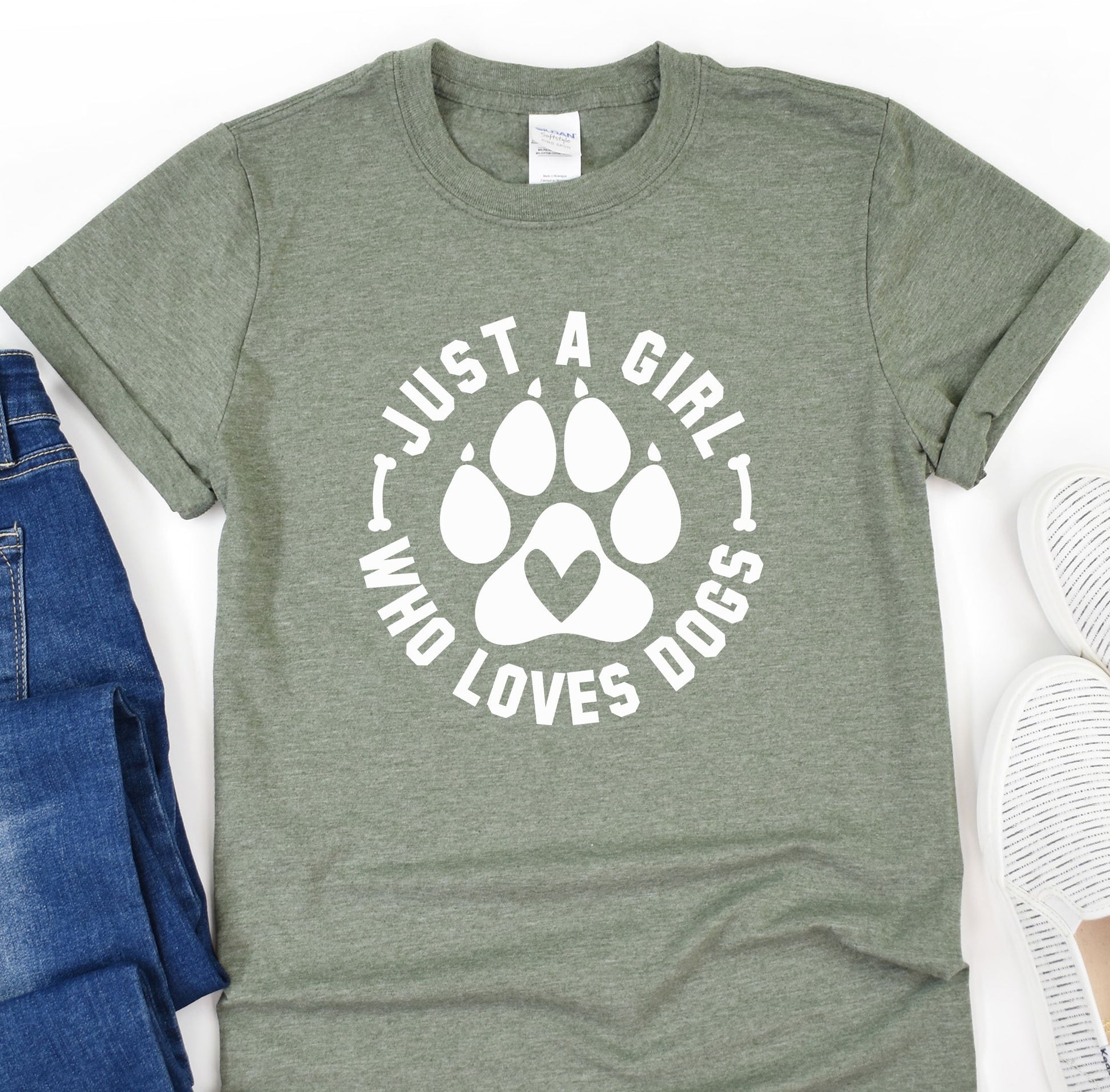 a t - shirt that says i just a girl who loves dogs