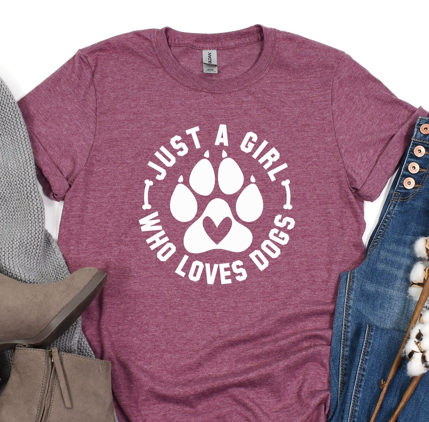 a women&#39;s t - shirt with a dog&#39;s paw on it