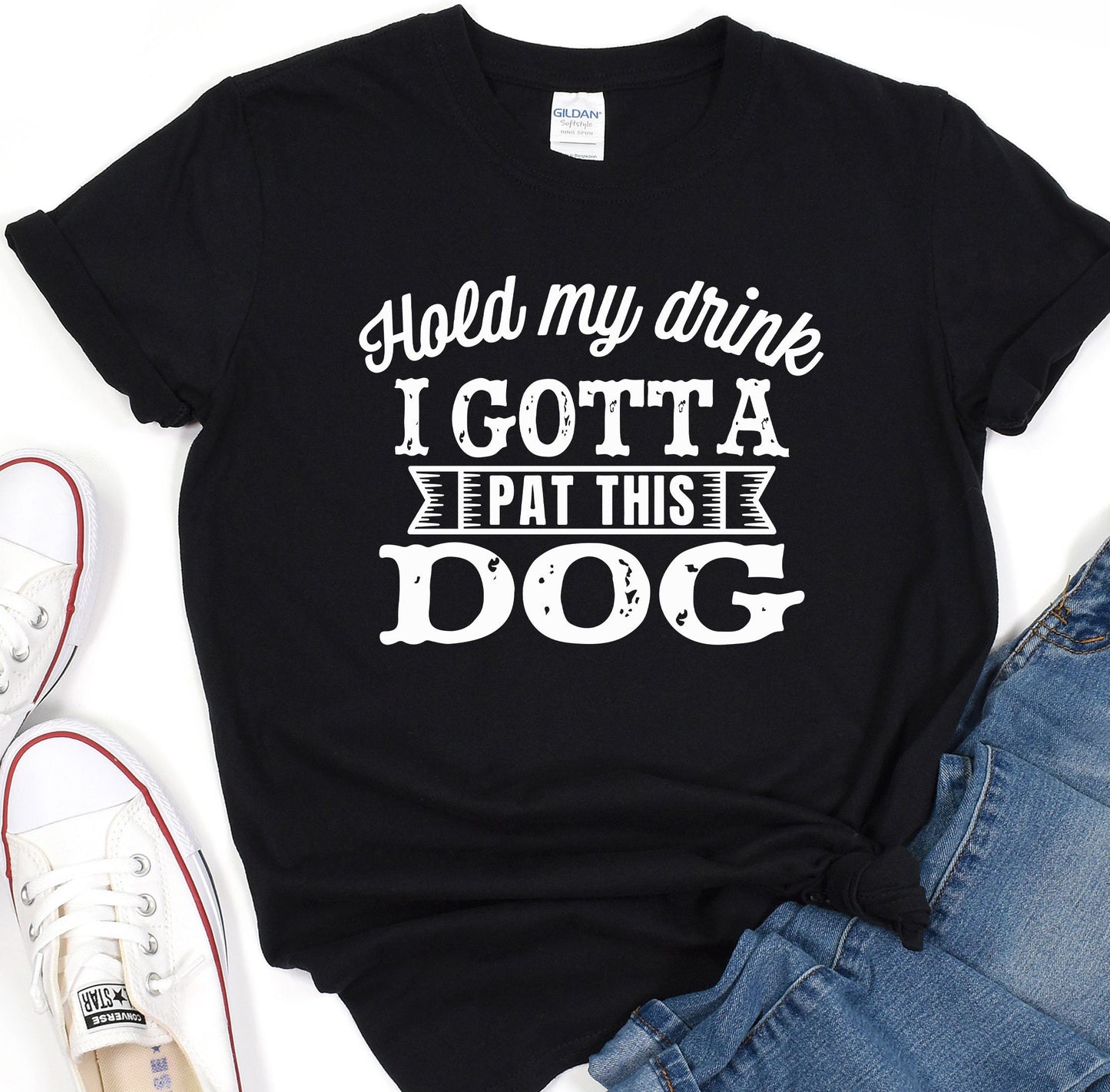 a black shirt that says i gota fat this dog
