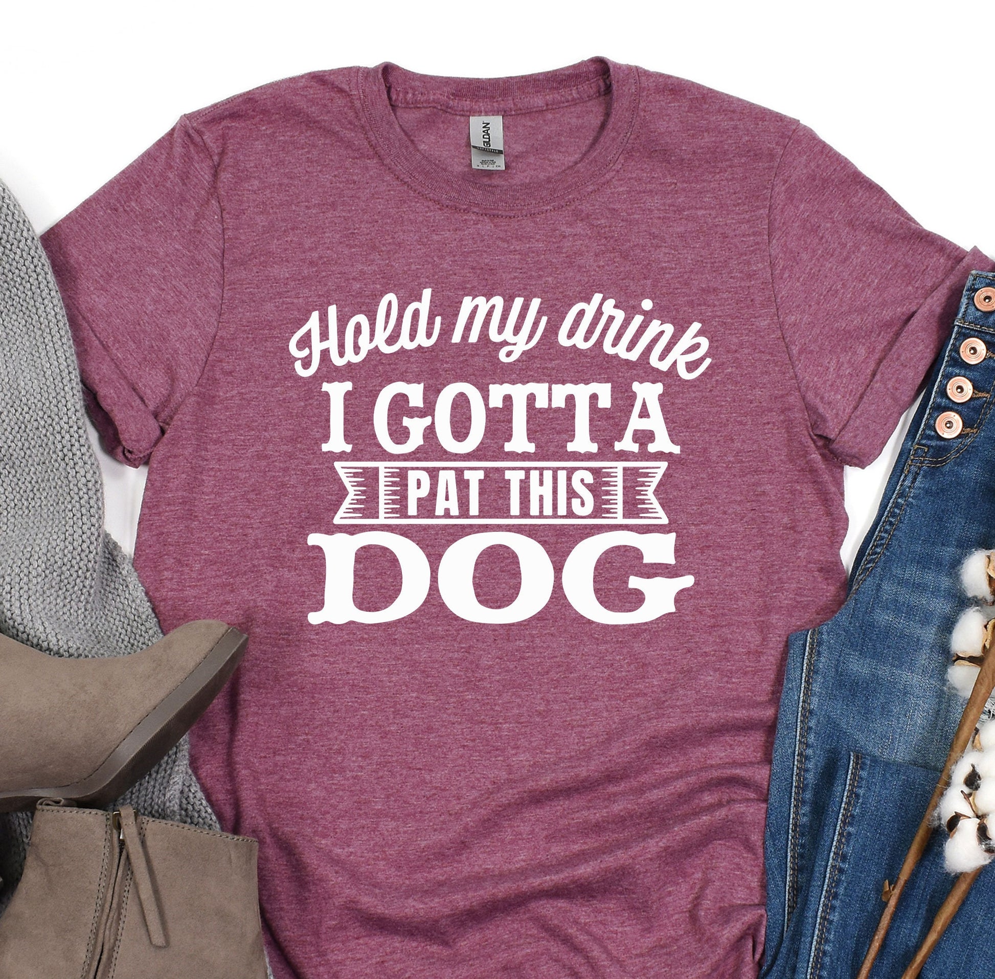 a t - shirt that says hold my drink i gota pat this dog