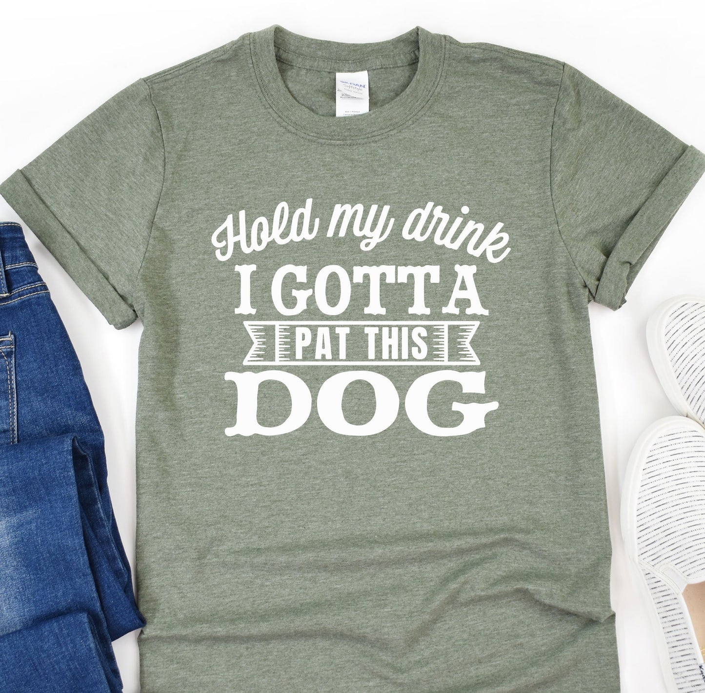 a t - shirt that says i gota pat this dog