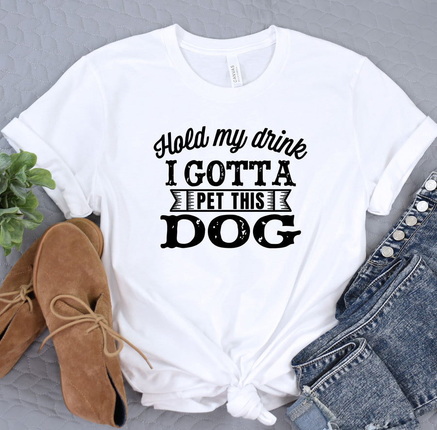 a white t - shirt that says i gota left this dog