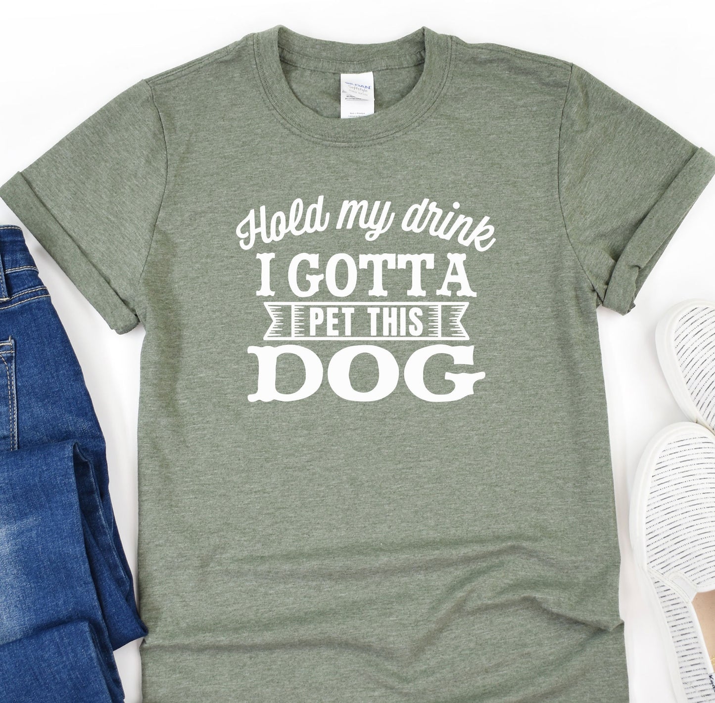 a t - shirt that says hold my drink i gota pet this dog