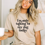 a woman wearing a t - shirt that says i'm only talking to my