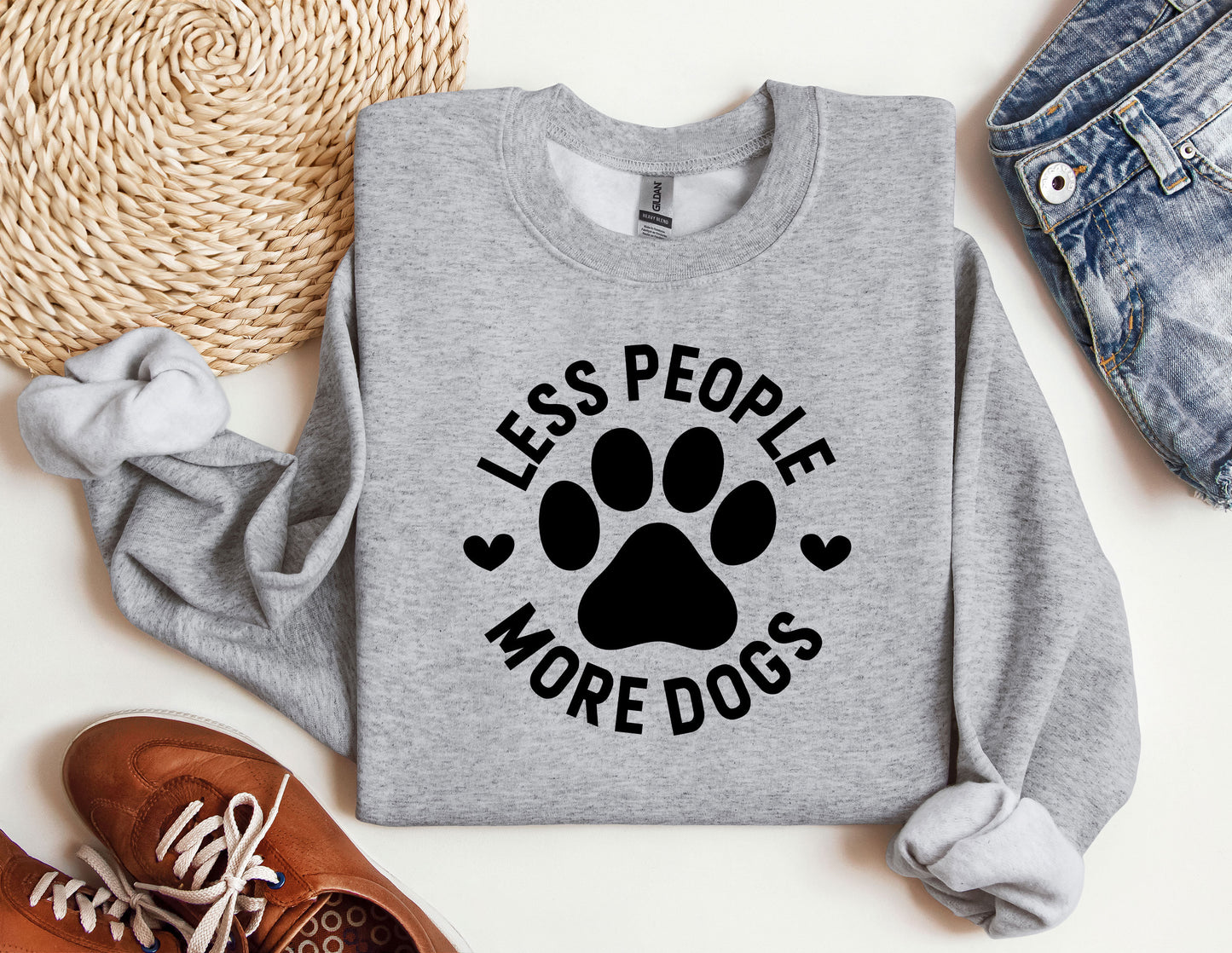 a grey sweatshirt with a dog&#39;s paw printed on it