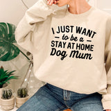 a woman wearing a sweatshirt that says i just want to be a stay at home