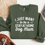 a green sweatshirt that says i just want to be a stay at home dog mum