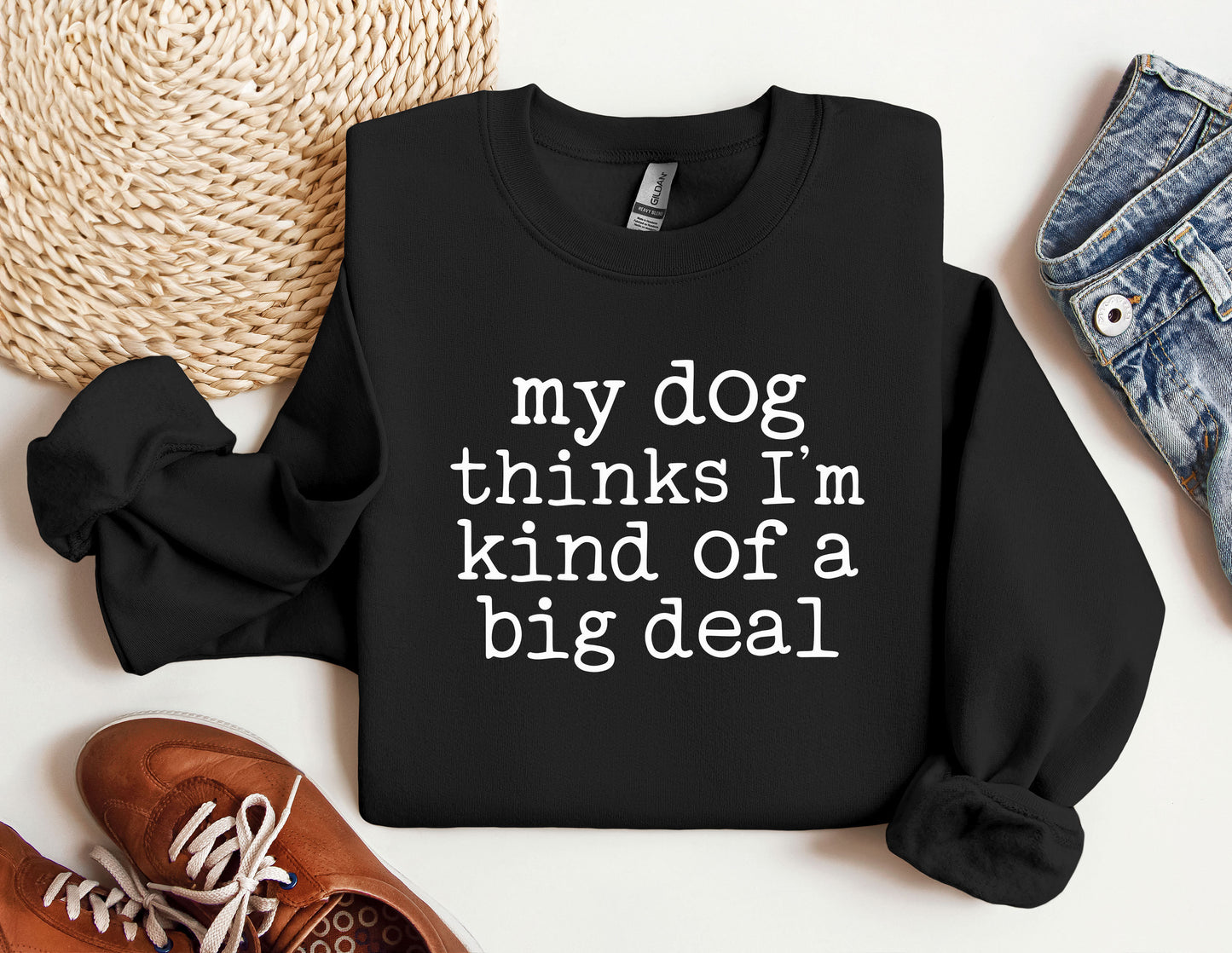 a black sweatshirt with the words my dog thinks i&#39;m kind of a big