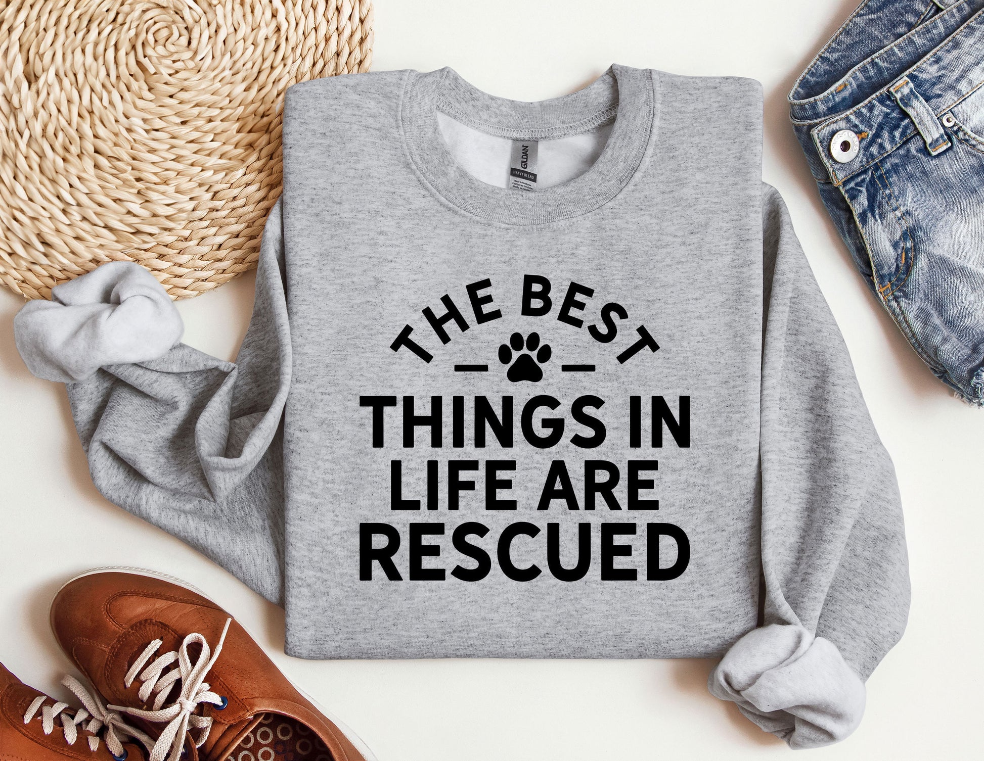 a sweater that says the best things in life are rescued