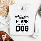 a white sweatshirt with a slogan that says sorry i can't i have plans