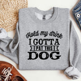 a sweatshirt that says hold my drink i got a pat this dog