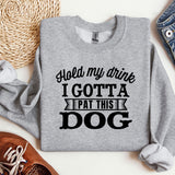 a sweatshirt that says hold my drink i got a pat this dog
