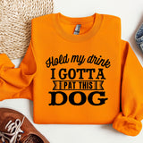 an orange sweatshirt with the words i got a pat this dog on it