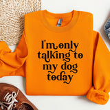 an orange shirt that says i'm only talking to my dog today