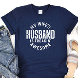 a t - shirt that says, my wife's husband is freakin '