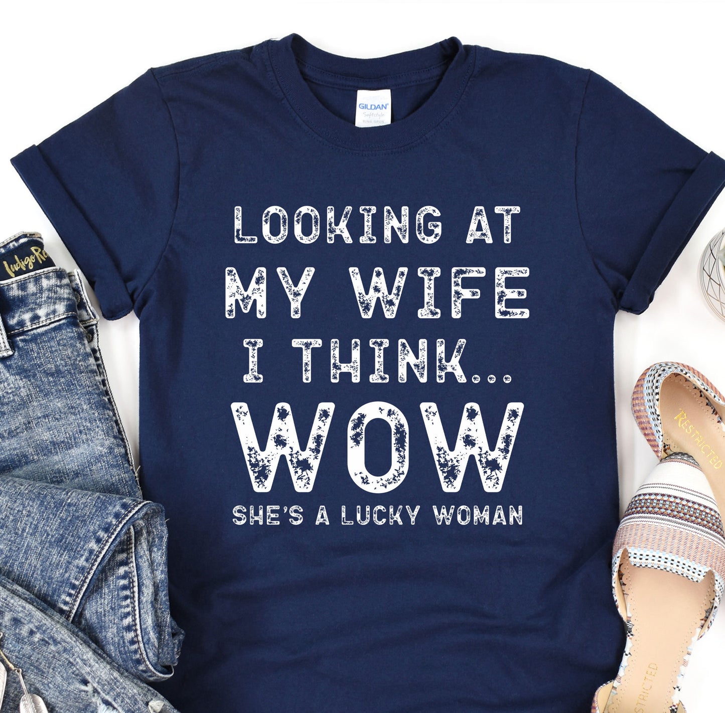 a t - shirt that says looking at my wife i think she&#39;s a