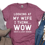 a t - shirt that says looking at my wife i think she's a