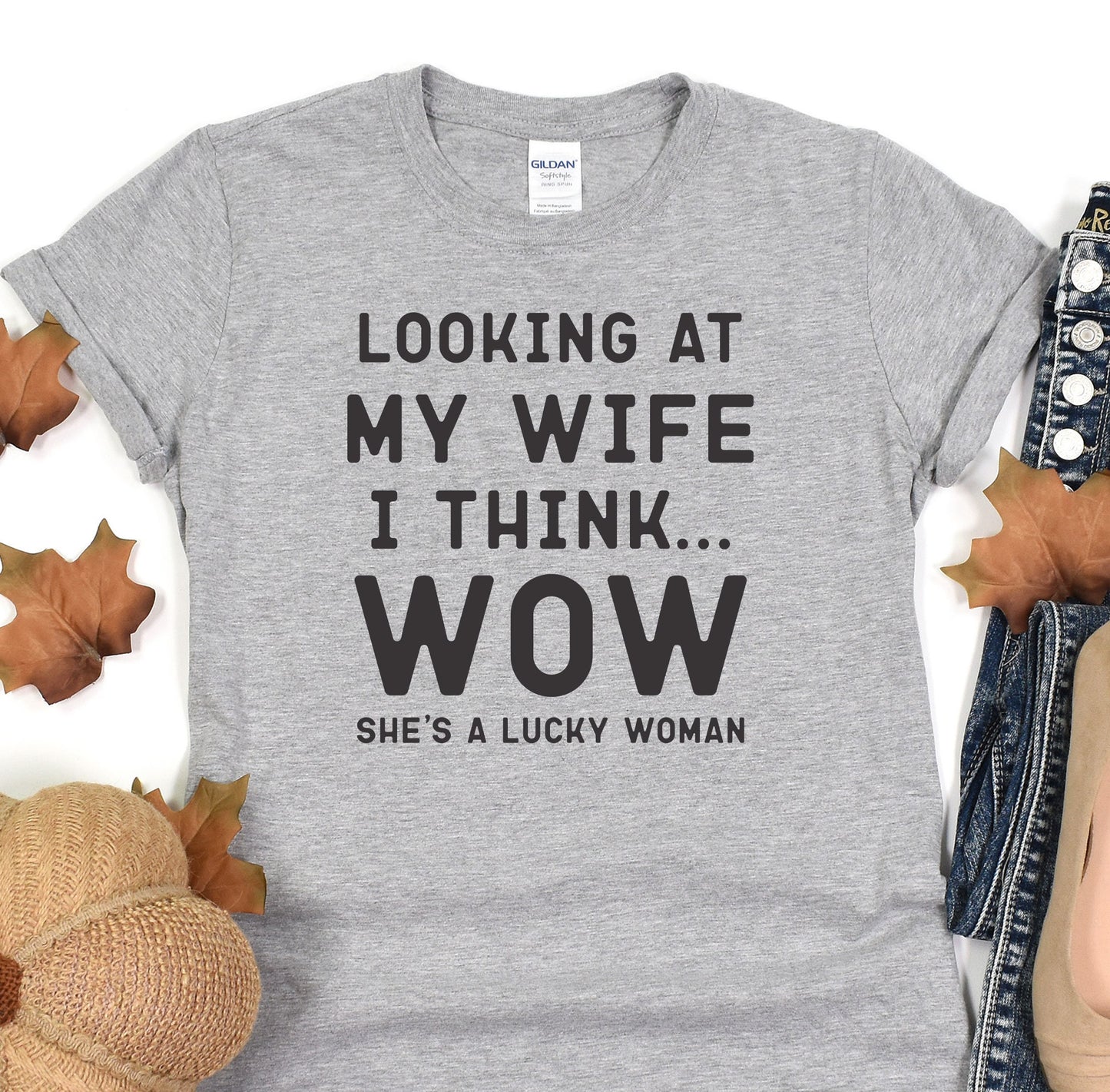 a t - shirt that says looking at my wife i think she&#39;s a