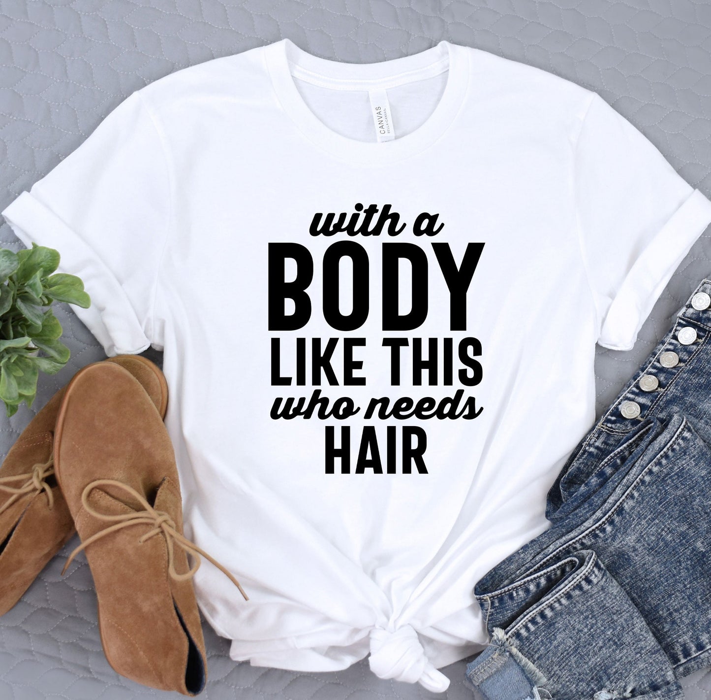 a t - shirt that says, with a body like this with needs hair