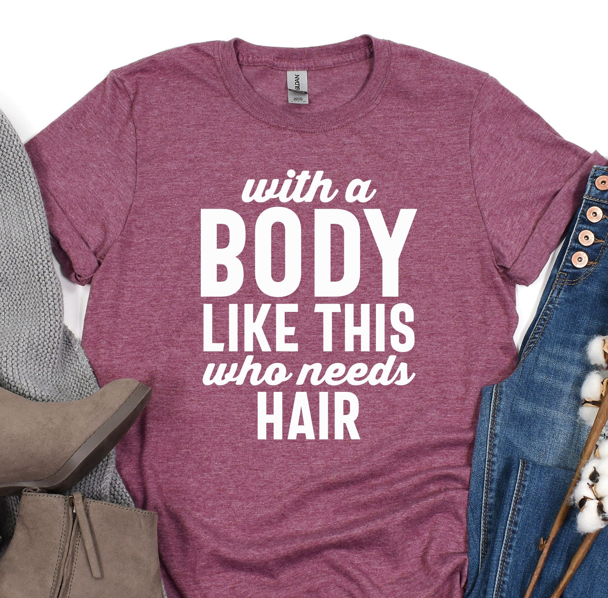 a t - shirt that says, with a body like this who needs hair