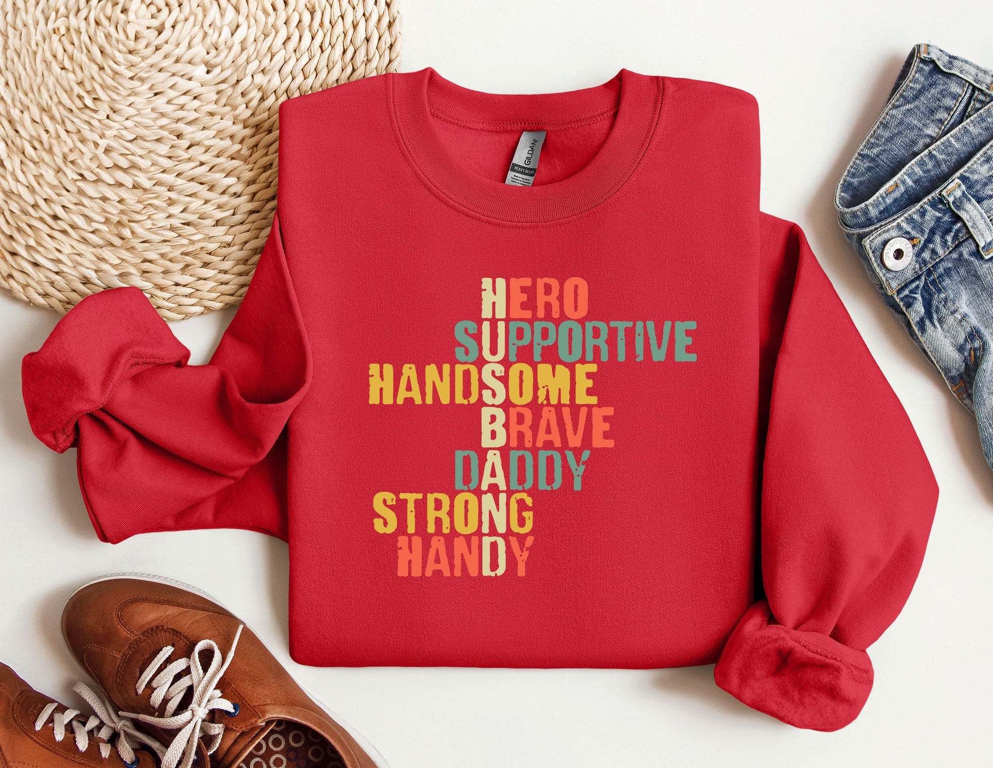 a red sweatshirt with the words hero on it