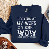 a sweatshirt that says looking at my wife i think she's a lucky woman