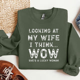 a sweatshirt that says looking at my wife i think she's a lucky woman