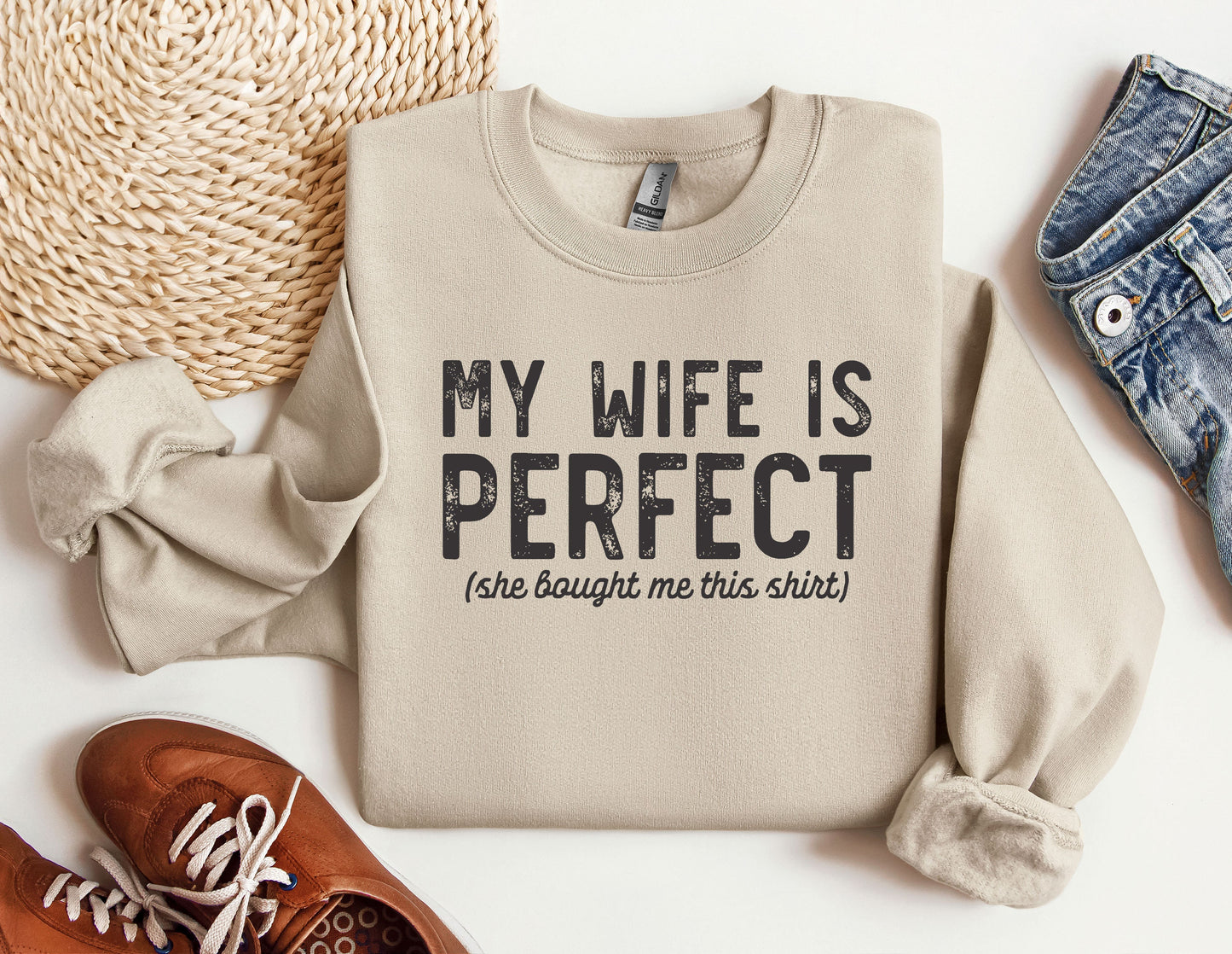 a sweater that says, my wife is perfect and a pair of shoes