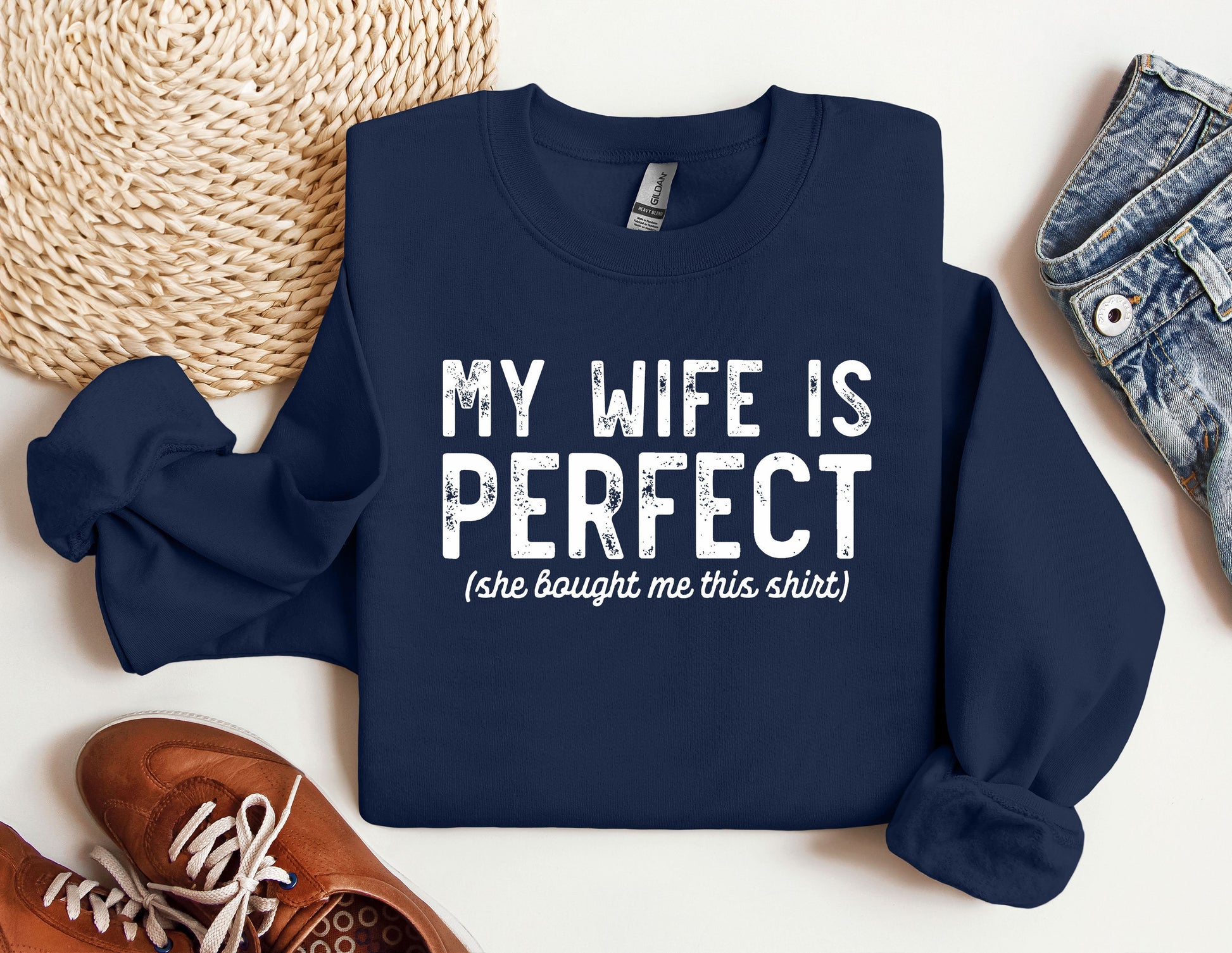 a sweatshirt that says, my wife is perfect she bought this shirt