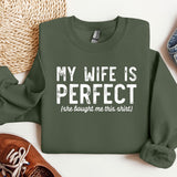 a green sweatshirt that says, my wife is perfect she bought me this shirt