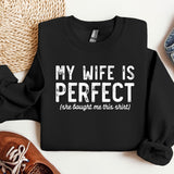 a black sweatshirt with the words my wife is perfect on it