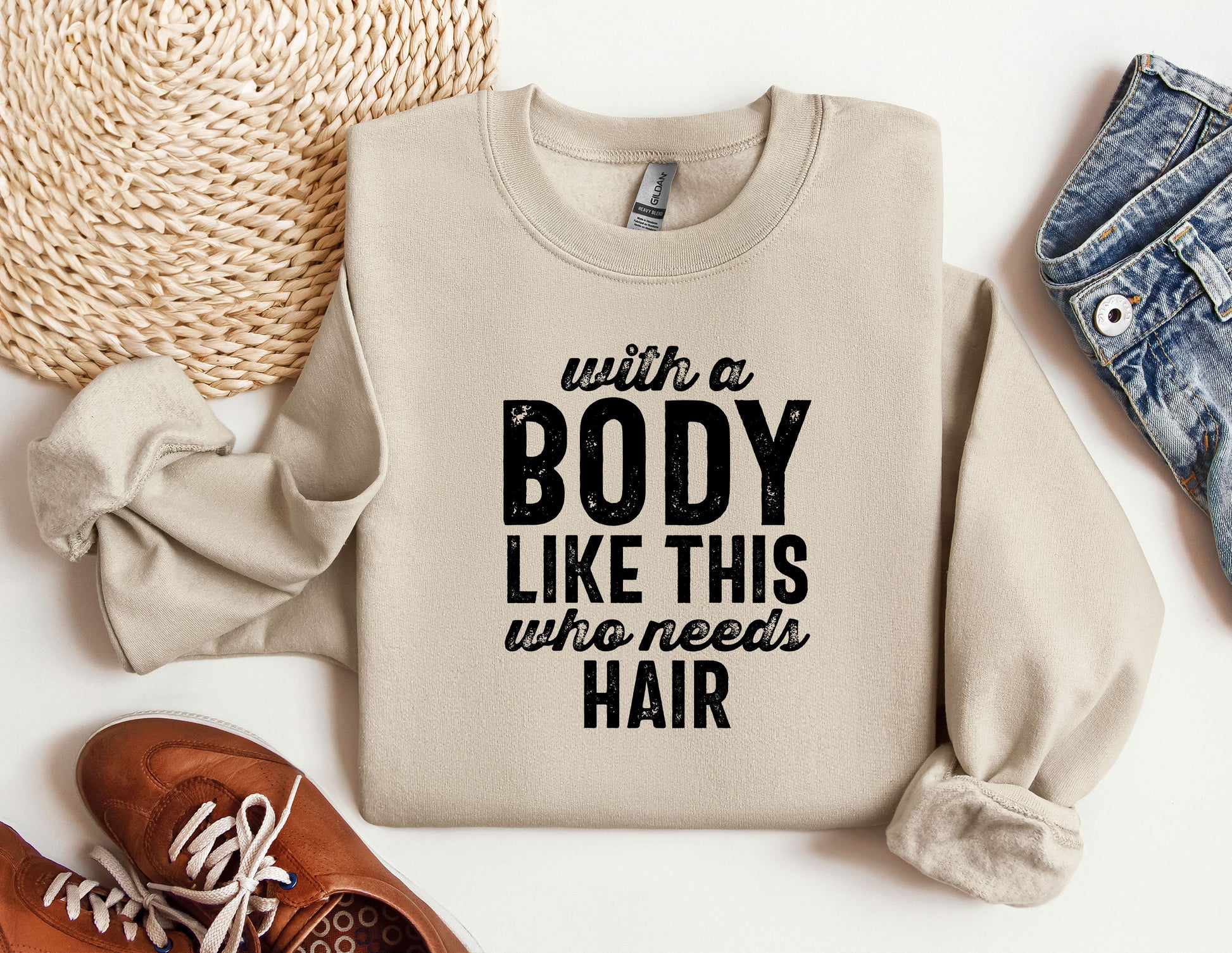 a sweater that says, with a body like this who needs hair