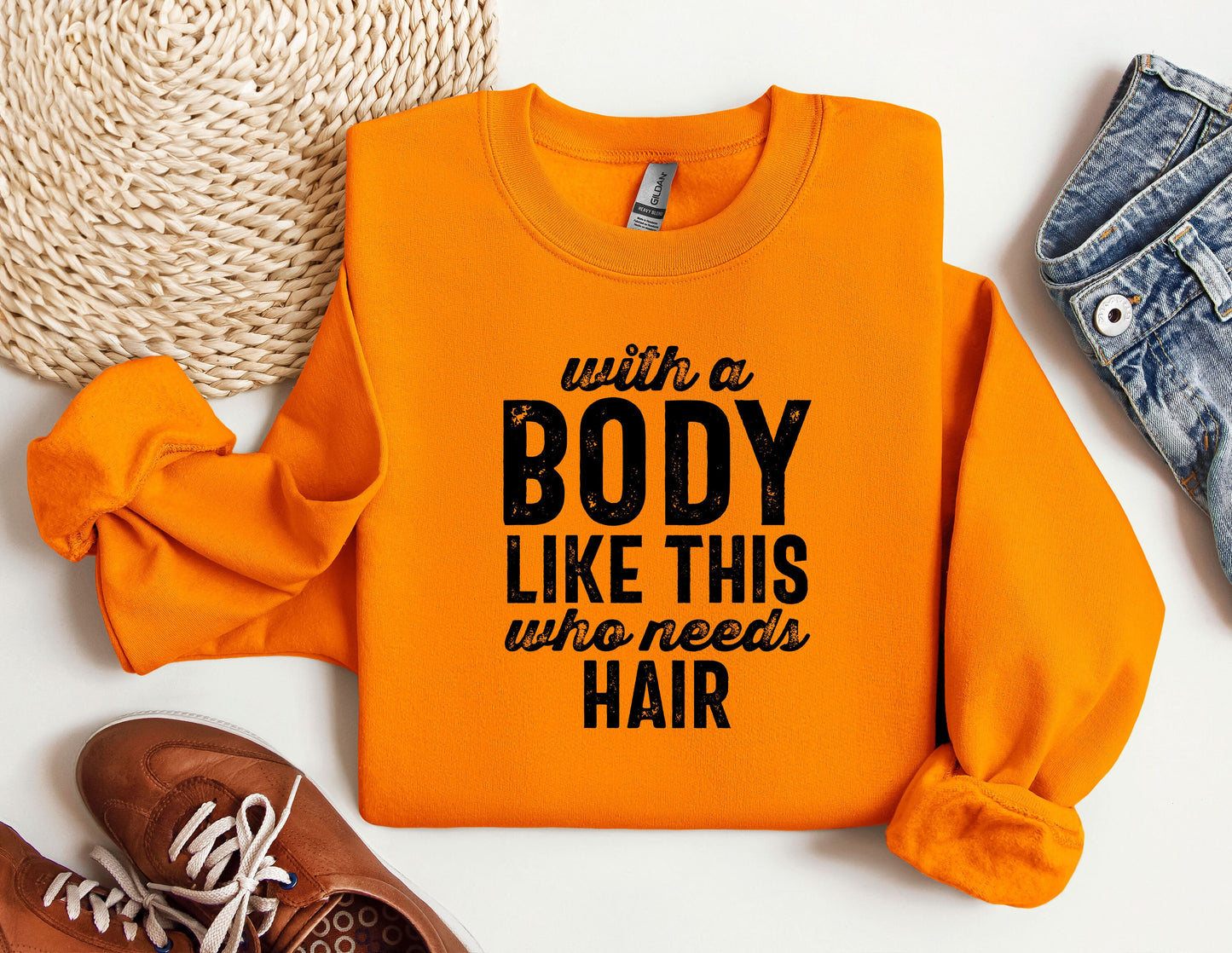 a shirt that says, with a body like this who needs hair