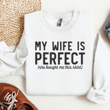 a white shirt that says, my wife is perfect she bought me this shirt