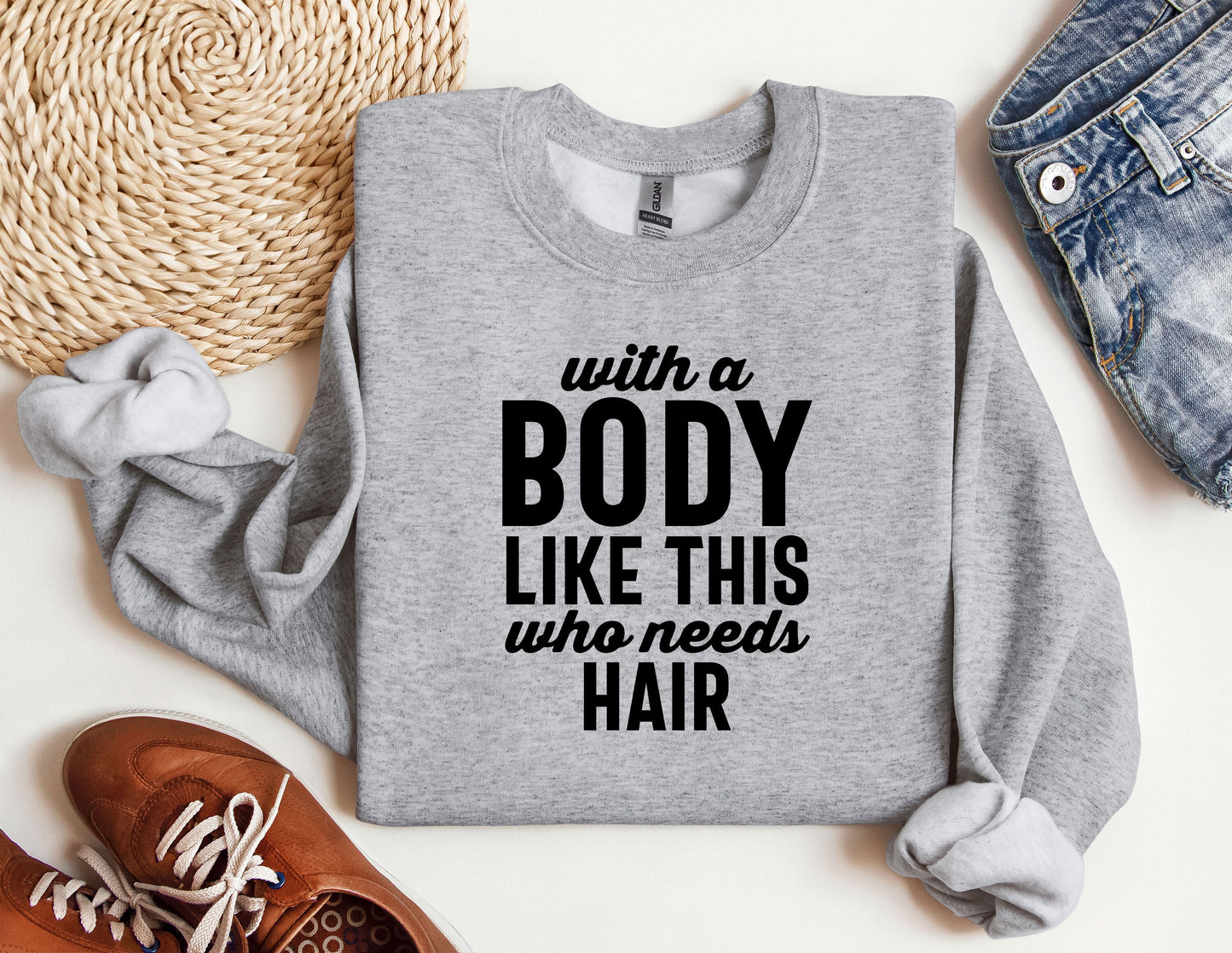 a sweatshirt that says, with a body like this who needs hair