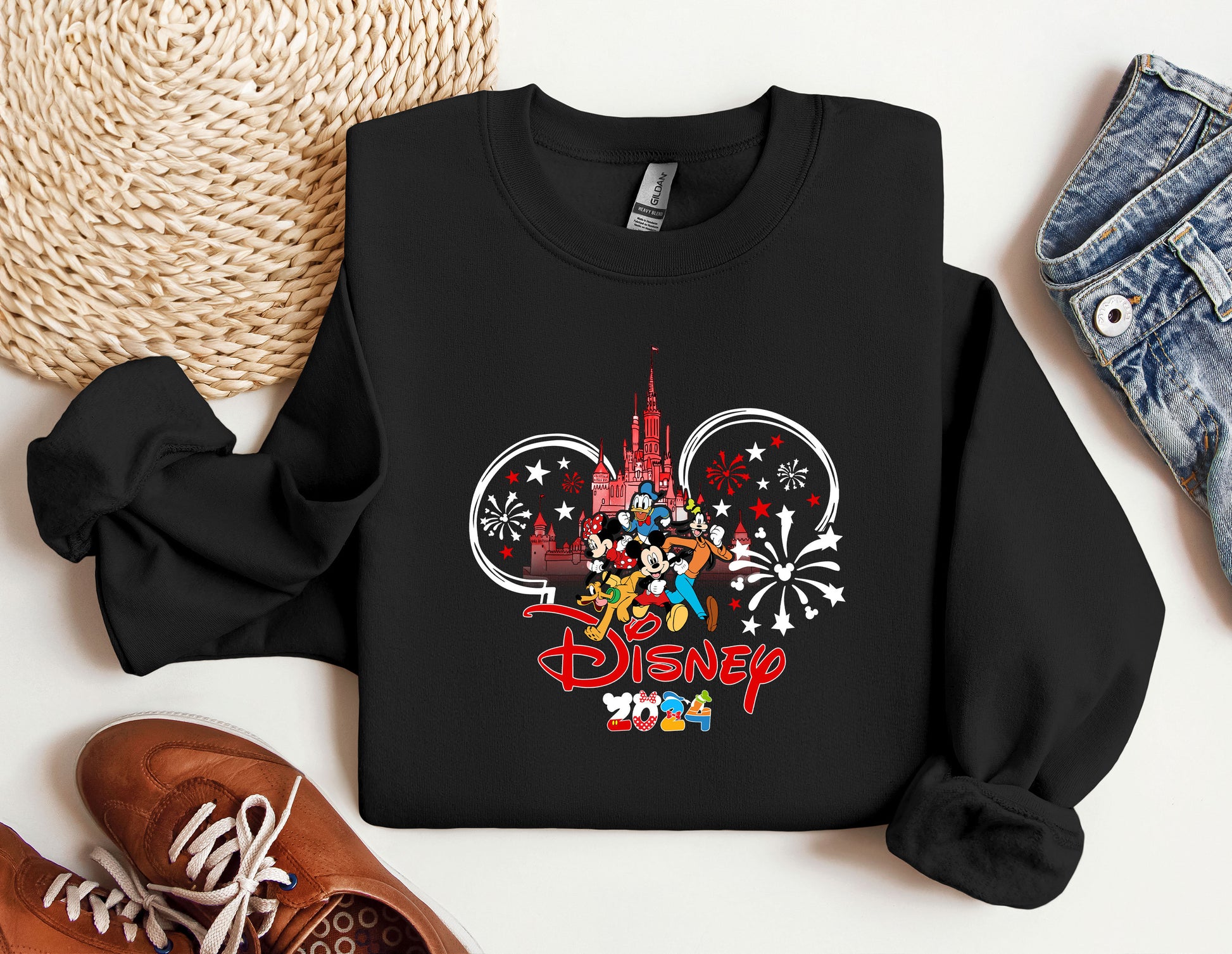 a mickey mouse shirt with fireworks on it