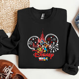 a mickey mouse shirt with fireworks on it
