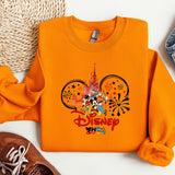 a pair of shoes and a sweatshirt with mickey mouse on it