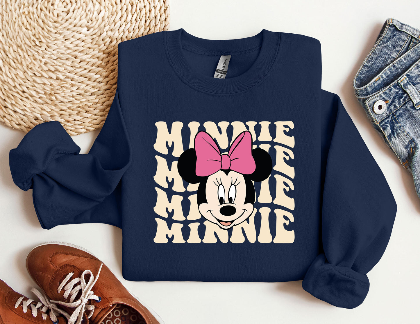 a blue sweatshirt with minnie mouse on it