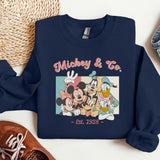 a sweatshirt with a picture of mickey and friends on it