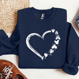 a blue sweatshirt with a heart drawn on it